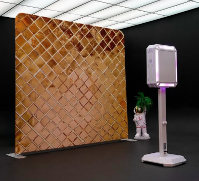 Luxury photo booth backdrop and illuminated photo booth at an event