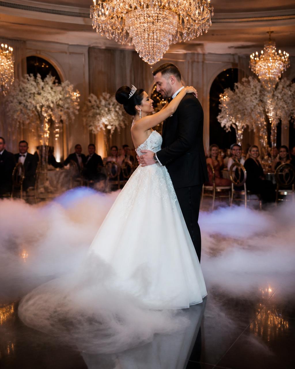 Dancing on the clouds effect at a romantic wedding